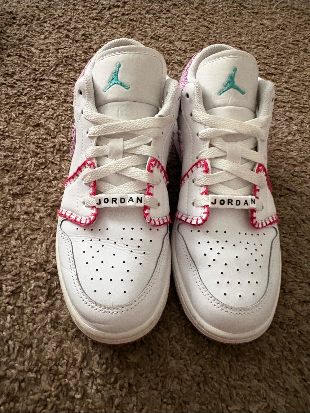 Jordan Kids White Sneakers with Teal Jumpman and Pink Trim